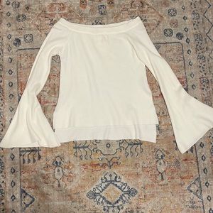 Ivory ribbed off the shoulder long bell sleeve blouse from Blu Spero